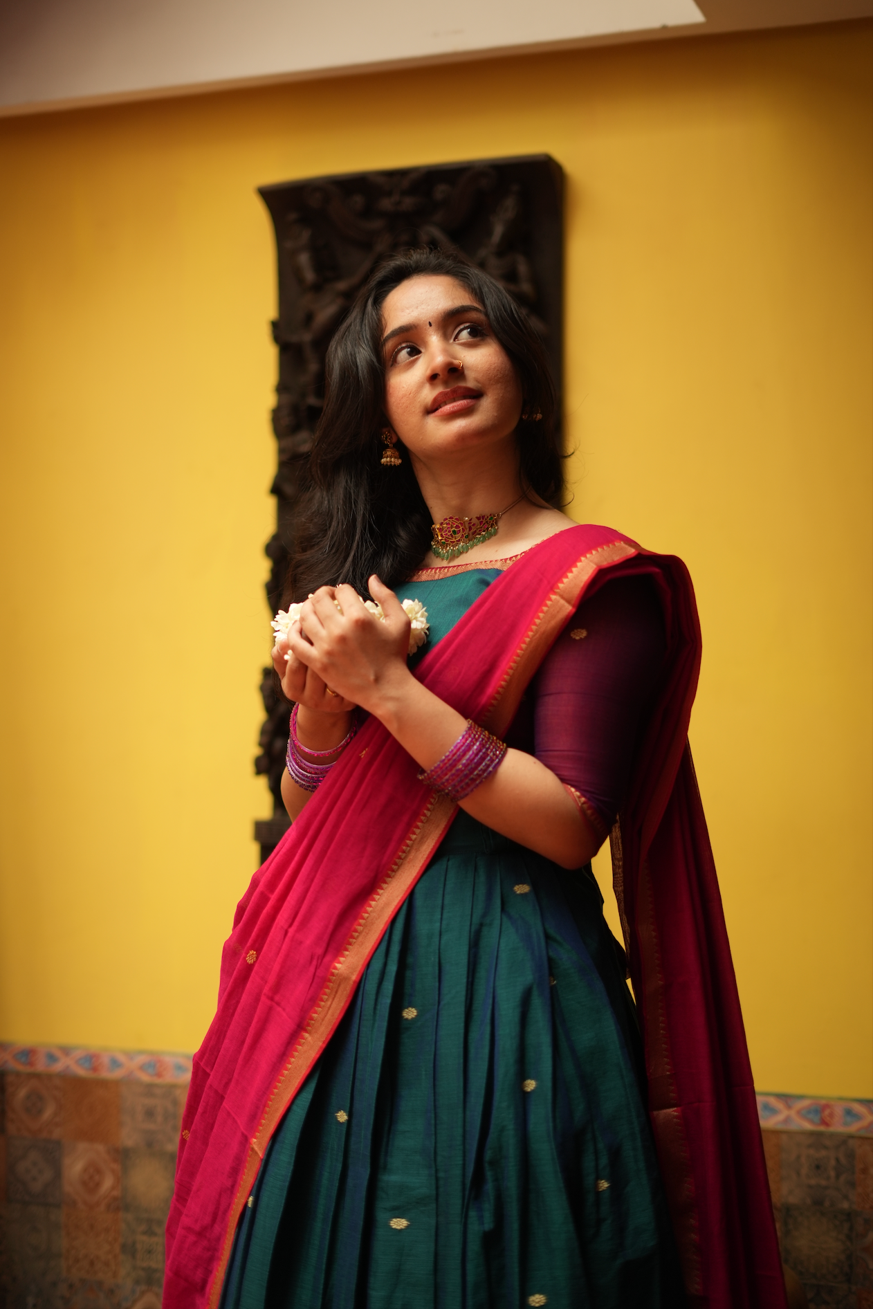 Beautiful half saree lehenga crafted in authentic handloom fabric, showcasing classic South Indian langa dhavani fashion.
