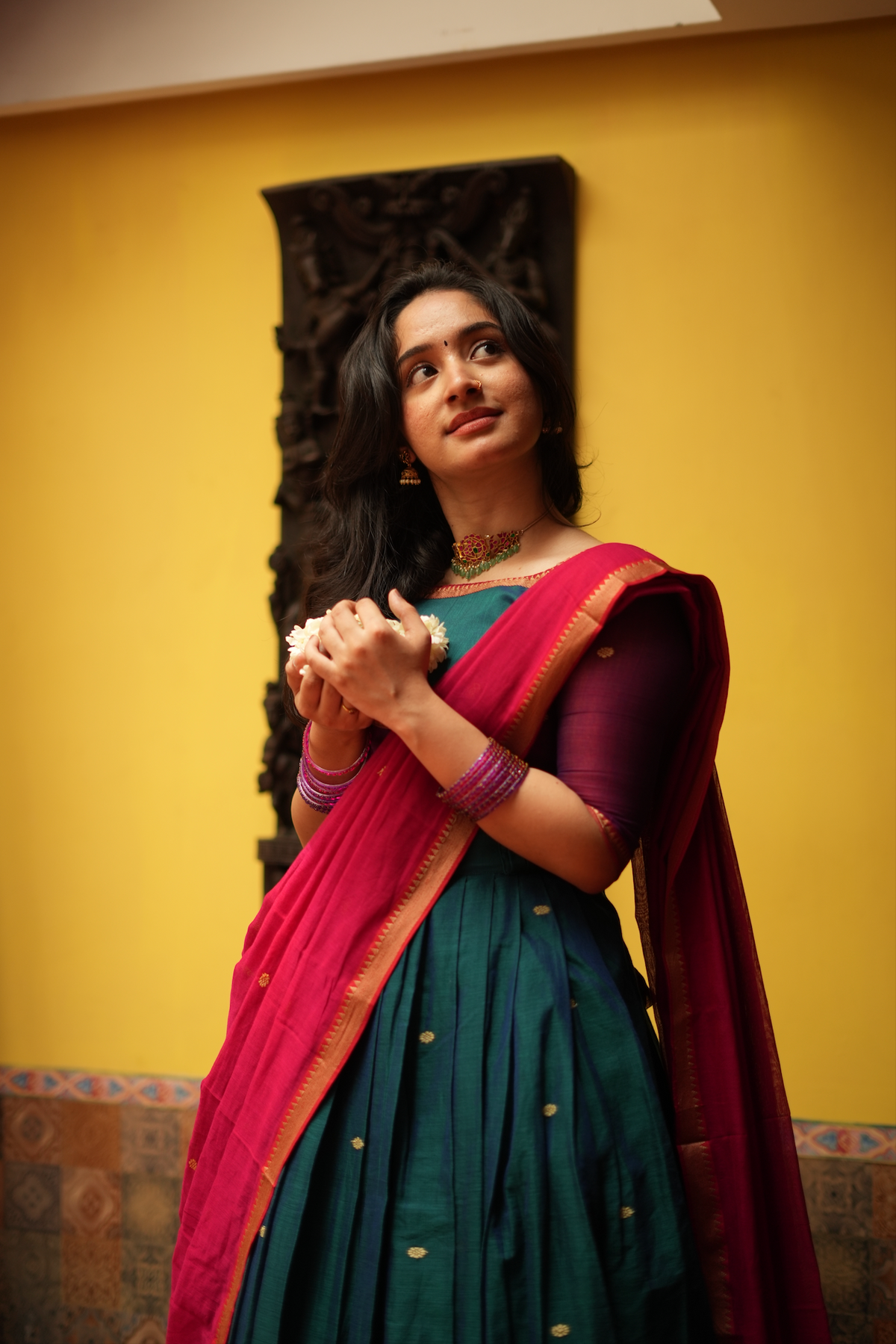 
Beautiful half saree lehenga crafted in authentic handloom fabric, showcasing classic South Indian langa dhavani fashion.
